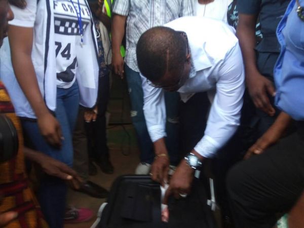 •Governor Obiano casting his ballot on Saturday morning. Photo: Ifeoma Okafor.