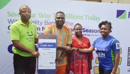 L-R: Nwosu Branch Leader, Fidelity Bank Plc, Matori, Bright Nwosu; Winner of N1m, Oni Daniel Abiodun; Wife of the cash prize winner of N1m, Oni Abimbola; Branch Leader, Fidelity Bank Plc, Fadeyi, Adetutu Makinde, at the  second monthly / first bi-monthly prize presentation of Get Alert in Millions season 4  (GAIM 4) in Lagos on Friday, Dec. 20, 2019. 