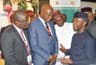 L-R: Managing Director, Shell Nigeria Exploration and Production Company, Bayo Ojulari; and the Managing Director, The Shell Petroleum Development Company of Nigeria (SPDC) Ltd and Country Chair, Shell Companies in Nigeria, Osagie Okunbor, receiving Chairman, Nigeria Economic Summit Group, Bukar Kyari and the Vice President, Prof. 'Yemi Osinbajo at the Shell exhibition stand at the opening of the 23rd Nigeria Economic Summit in Abuja... on Tuesday, Oct. 10, 2017.