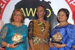 Deputy governor of Akwa Ibom State, Lady Valerie Ebe (left), Wife of the Vice President-Elect Mrs. Dolapo Oshinbajo (center) and wife of the Lagos State Deputy Governor H.E Hon Victoria Adejoke Orelope-Adefulire (right) after collecting their award for African Women of Worth, at the 7th edition of African women in Leadership organization conference 2015 In Lagos.
