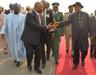 IMAGES FROM GHANAâ€™S PRESIDENTIAL INAUGURATION: President Goodluck Jonathan (r) in a handshake with Gov. Godswill Akpabio (m), at Accra Airport when the President arrived for the Jan. 7 swearing-in ceremony of President John Mahama.