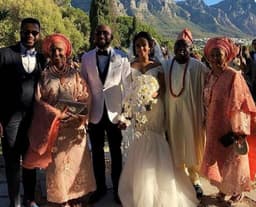 Photo shows the couple, Banky W and Adesua with both parents during their wedding in Cape Town on 25th Nov. 2017.