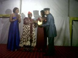 The 2012 Nollywood Outstanding Personality Awards (NOPA) was held in Ikeja, Lagos, on Sunday, Nov. 25, 2012. L-R: The hostess, actress Benita Nzeribe; Royal Father of the Day, Hyacinth Ohazulike, Eze Ndigbo Lagos, presenting the Grand Patron of Art award to Governor Godswill Akpabio of Akwa Ibom State, represented by Information Commissioner, Mr. Aniekan Umanah. Standing in-between them is the Mother of the Day, immediate past Minister of Information and Communications, Prof. Dora Akunyili.