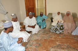 Former Kano State Governor, Senator Arc, Kabiru I. Gaya (2nd left) condoling the wife (right) of late former Transport Minister, Alh. Umaru Dikko at his residence Kaduna on July 5, 2014. Dikko died in London on July 1, aged 77, and was buried on the 5th.