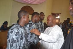 Akpabio condoles the Eduoks: Governor Godswill Akpabio of Akwa Ibom State condoling the sons of former Chief of the Air Staff, Air Marshal Nsikak Eduok (rtd.), during the funeral service of their mother at United Evangelical Church, Ibesikpo Asutan LGA.