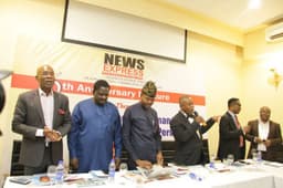 L-R  Leo Stan Ekeh, Femi Adesina and other members of the high table at the 5th anniversary lecture of News Express held at Sheraton Hotel Towers on Thursday, Sep. 28, 2017.