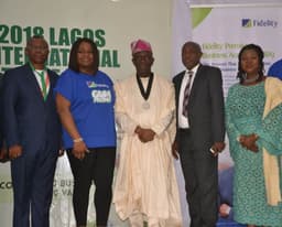 L-R: Chairman, Trade Promotion Board of the Lagos Chamber of Commerce and Industry (LCCI) Gabriel Idahosa; Executive Director, Shared Services and Products, Fidelity Bank, Chijioke Ugochukwu; President, Lagos Chamber of Commerce and Industry (LCCI), Babatunde Ruwase; Divisional Head, Corporate Services, Fidelity Bank, Tonie Obiefuna; Deputy President, Lagos Chamber of Commerce and Industry (LCCI) Agnes Shobajo during the Fidelity Bank Special Day at the Lagos International Trade Fair in Tafawa Balewa Square, Lagos.