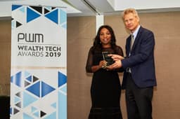 Editor-in-Chief, Professional Wealth Management at Financial Times, Yuri Bender, presenting the Wealth Tech Award to Divisional Head, Fidelity Private Banking, Chioma Nwankwo in London where Fidelity Bank emerged the â€˜Best Digital Networking Bank For Entrepreneurs, Africa 2019â€™ recently.