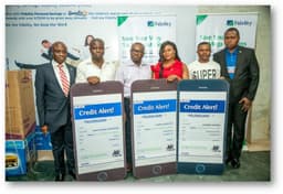 L-R Regional Bank Head, Ikeja Region , Fidelity Bank Plc. Ken Opara; Winners of N1 million, Ayoka Chigozie Christopher; Fred Uche Oko Itiri, husband of Chidinma Favour Itiri, winner of N1 million, Chizoba Nwaoba; and  Divisional Head, Retail Banking, Fidelity Bank Plc. ,Richard Madiebo; at the third prize presentation of the Get Alert in Millions Promo Reloaded held at Fidelity Bank Corporate Head Office in Lagos.   