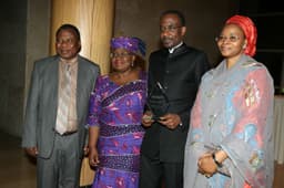 L-R:Nigerian Ambassador to the US, Prof. Adebowale Adefuye, Coordinating Minister for the Economy /Minister of Finance, Dr. Ngozi Okonjo-Iweala, Gov Sanusi and his wife, shortly after Sanusi received the award of Africa Central Bank Governor of the Year from Emerging Markets Magazine, on Oct. 12, 2013 in Washington DC, USA.