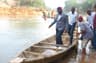 DARING: Governor David Umahi of Ebonyi State about to cross the Okawu-Abaomege River to inspect the ongoing construction of a bridge across the river ...on Saturday, Feb. 25, 2017.