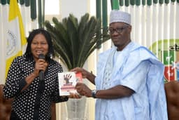 President, Women Arise and Centre for Change, Dr. Joe Okei Odumakin (left) presenting souvenir to Kwara State Governor, Dr. Abdulfatah Ahmed during courtesy visit to the Governor at Government House, Ilorin . . . Monday, July 9, 2018.