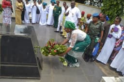 Representative the Wife of the President and Wife of Governor of Anambra State, Chief (Mrs.) Ebelechukwu Obiano, laying a wreath at the grave-side of the late Maj. Gen. Thomas Umunnakwe Aguiyi-Ironsi during the 50th Anniversary Memorial of the death of Late Maj.Gen. Aguiyi-Ironsi held in Umuahia on Friday, July 29, 2016.