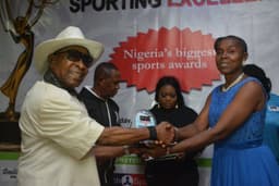 Prince Oduah presenting an award to ikechukwu Ezenwa representative at the Nigerian Award For Sporting Excellence organised by Daily Sports Nigeria, held on Saturday night, December 2, at Airport Hotel, Ikeja, Lagos.