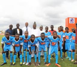 Governor Ibikunle Amosun of Ogun State (middle, back row), Speaker, Ogun State House of Assembly, Rt. Hon. Suraj Adekunbi (5th left), Managing Director, GTBank, Mr. Segun Agbaje (3rd left), Commissioner for Sports, Mr. Afolabi Afuape (2nd left), Special Adviser to the Governor on Sports, Mr. Segun Adesanya (left) and the Alamuwa Grammar school, Ado-Odo/Ota football team, winner of the 6th edition of the GTBank-Ogun State Principals Cup, at the MKO Abiola International Stadium, Abeokuta , on Thursday, July 26, 2018.