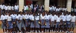 Principal, Olivet Baptist High School, Oyo, Mrs A.I Ogunmola; Executive Director, Lagos and West Bank, United Bank for Africa, Mr. Liadi Ayoku; Vice Principal, Academic, Mr. E.A Adedeji,  and Vice Principal, Admin, Mr. O.L,  Sulola,  flanked by the students of the Olivet Baptist High School , Oyo,  during the financial literacy training programme for students of the school, an  initiative of Central Bank of Nigeria, in commemoration of World Savings Day on Monday in Oyo, Oyo State.