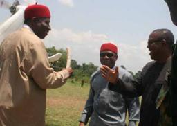 â€œOYE ISI NNOOOO!â€: Abia Governor T. A. Orji watches as President Goodluck Jonathan (left) is being greeted the Igbo way by Gov. Peter Obi of Anambra State while welcoming him to the dedication of a church built by the Deputy Senate President, Hon. Ike Ekweremadu for his Mpu Community, Enugu State, April 1, 2013. Photo courtesy Mazi Odera.