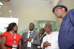 L-R: Clinical Health Adviser, The Shell Petroleum Development Company Of Nigeria, Dr. Olayinka Mosuro; Social Performance Adviser, Shell Nigeria Exploration and Production Company (SNEPCo, Hope Nuka; Vice President,  Oil and Gas Trainers Association of Nigeria, Mazi Sam Azoka Onyechi; former military head of state, General Yakubu Gowon (retd); and Executive Secretary, Nigerian Content Development and Monitoring Board, Mr. Simbi Wabote, during an inspection of the exhibition booth of Shell at the 2019 Annual Conference and Exhibition of the Oil and Gas Trainers Association of Nigeria in Lagosâ€¦ on Monday, April 22, 2019.