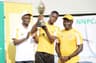 Lagos Liaison Officer, Federal Ministry of Youths and Sports, Dr. Segun Olaitan; Most Outstanding Male Player, 16-year old Phillip Abayomi in the U-18 category; and the Human Resources Director, Shell Nigeria Exploration and Production Company, Mr. Obinna Anaba, during the presentation of trophy to Abayomi at the finals of the 2017 edition of the NNPC/SNEPCo Junior Open Tennis Championships held at the Lagos Lawn Tennis Clubâ€¦ on Saturday, March 11, 2017.