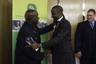 Former President Kenneth Kaunda in a warm embrace with CBN Governor, Sanusi Lamido Sanusi, after handing over to him the African Reserve (Central) Bank Governor of the Year 2013 Award on November 9 in Pretoria, South Africa, while CEO, Kenneth Kaunda Children of Africa Foundation, Mr Jeff Eyman, looks on.