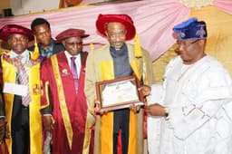 The Pro Chancellor, Chairman  Governing Council Oduduwa University, Osun State, Chief Ramon Adegoke Adedoyin, Vice Chancellor, Prof J. Adeleke Ogunwale, CBN Governor, Mallam Sanusi Lamido Sanusi, and Chairman of Protocol Committee, Alh S. A. Nofiu, at the conferment of honourary doctorate degree on Sanusi on  Nov. 23, 2013.