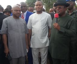 

R:L- Governor David Umahi of Ebonyi State; Deputy Governor Kelechi Igwe; and Commissioner for Local Government and Chieftaincy Matters, Barr. Samuel Okoronkwo,at the commissioning of 13  bulldozers  for massive rice production across the LGAs in the state in Abakaliki on 19th Feb, 2016
