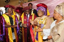 Wife of the Prof Chancellor, Chairman and Governing Council of Oduduwa University, Osun State, Mrs. Iyabo Adedoyin, the Coordinating Minister of the Economy and Minister of Finance, Dr. Ngozi Okonjo-Iweala, Oduduwa University Vice Chancellor, Prof J. Adeleke Ogunwale, Chairman of Protocol Committee, Alh S. A. Nofiu, and a guest at the conferment of honourary doctorate degree on Okonjo-Iweala on Nov. 23, 2013.