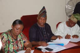 L-R: Ogun State Commissioner for Agriculture, Mrs. Ronke Sokefun, Secretary to the Ogun State Government, Barr. Taiwo Adeoluwa and Chairman, Arewa Cotton, Prof. Michael Olayiwole during the signing of Memorandum of Understanding (MoU) on Cotton Production, Processing and Marketing at the Governor's Office Press Centre, Oke-Mosan, Abeokuta...yesterday 