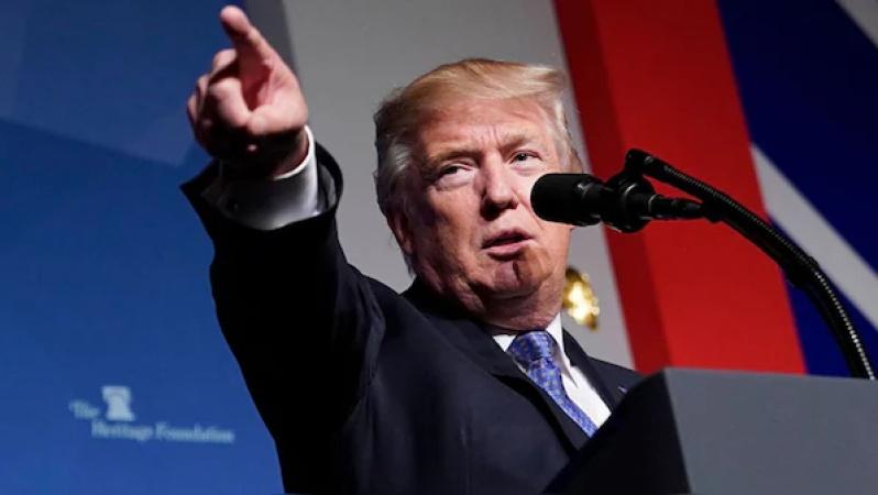 Trump vows to end migrant ?invasion? of US, suspend refugee resettlement programme