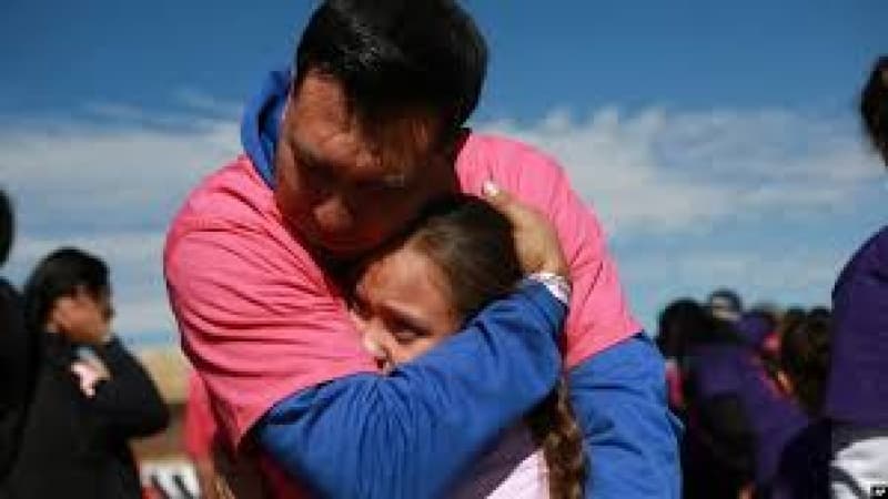 Families separated by US-Mexico border reunite for a few precious minutes