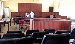 Suspected female arms dealer collapses in court