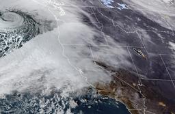 Deadly bomb cyclone cuts power for thousands in US north-west