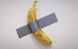 Duct-taped banana artwork sells for $6.2m in NYC
