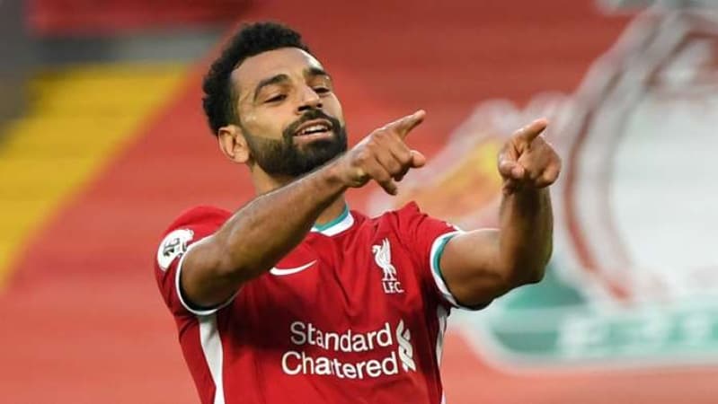Man Utd draw at Liverpool to slow Reds' title charge