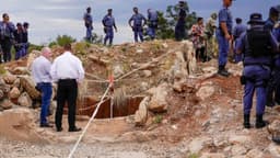 At least 100 illegal miners reportedly dead after months trapped in South African mine, group claims