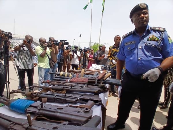 Dismissed Immigration officer nabbed attempting to sell guns to bandits in Abuja