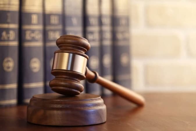 Couple docked for allegedly pouring hot water on neighbour