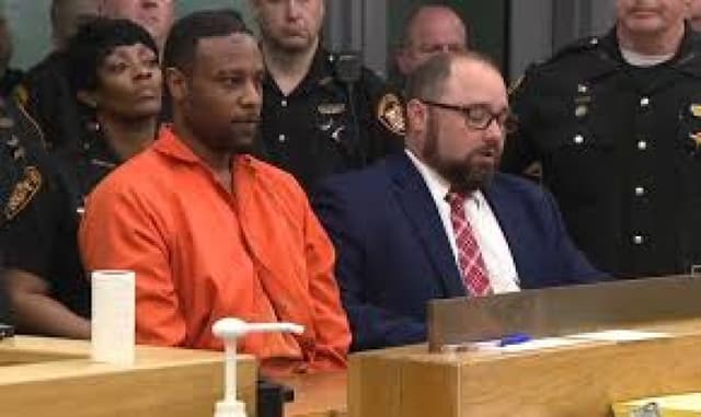 Father charged with killing deputy a day after police killed son