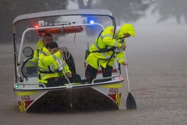 Four dead, several missing in record Australia flooding