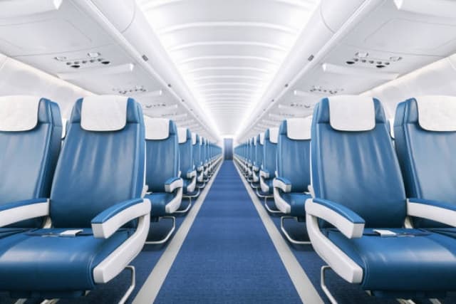 Man abandons grieving partner in economy after getting a free upgrade to business class on 14-hour flight
