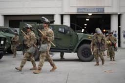 Soldiers deployed by Trump arrive in LA to crush immigration protests