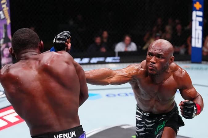 JUST IN: Kamaru Usman takes down Buckley in UFC main event