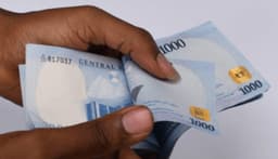 Naira firms up after banks resume international usage of local currency cards