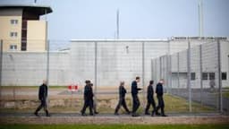 Prisoner escapes in fellow inmate's bag