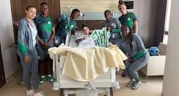 Super Falcons visit injured South African forward Salgado in hospital