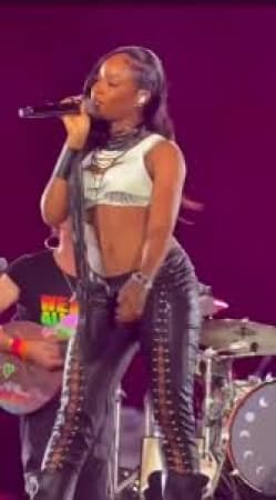Ayra Starr performs before Lionel Messi at Coldplay
