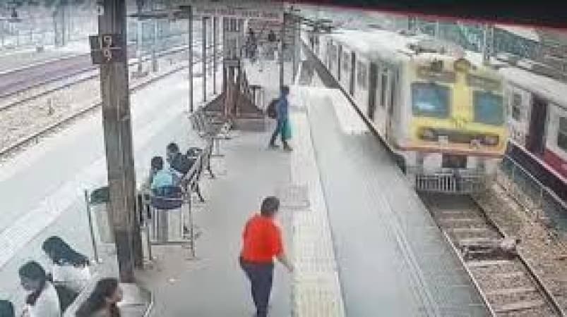 Man jumps on to moving high-speed train