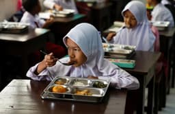 Over 300 fall ill after eating free school lunches in Indonesia