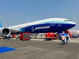 A judge who struck down a $72 million verdict against Boeing after trading company stock was removed from the case