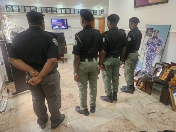 Police arrest officers over money-counting video